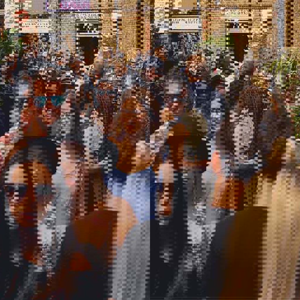 People walking down a busy street