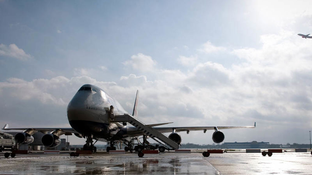 A large airplane on the runway.