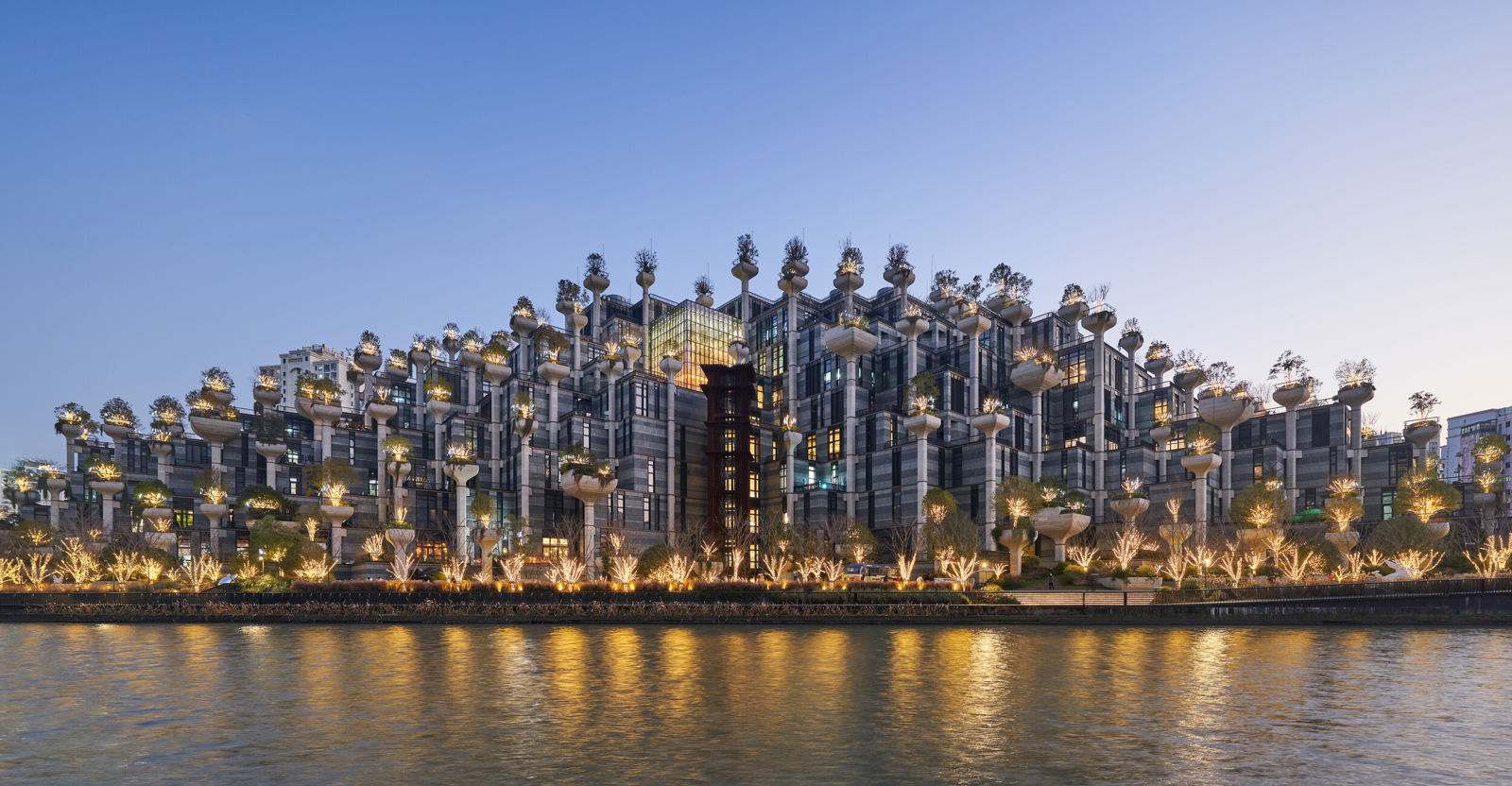 A city with lights on at night.