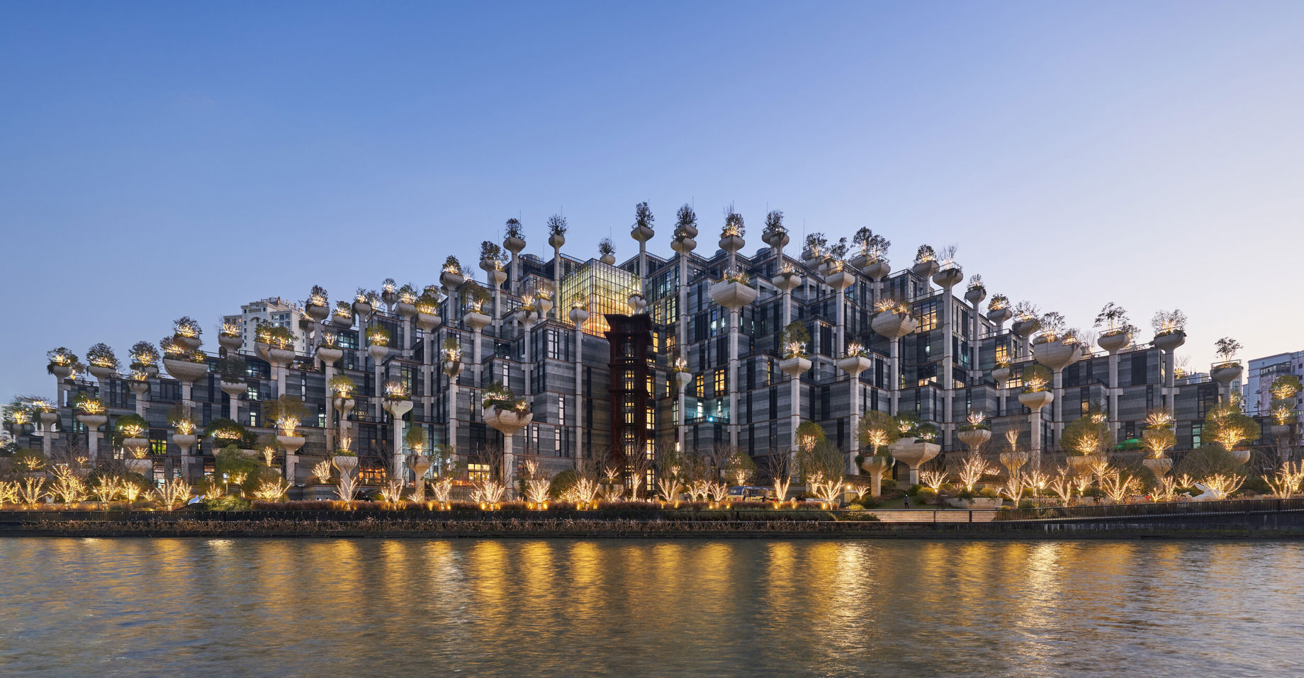 A city with lights on at night.