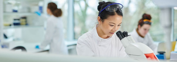 Woman using a microscope